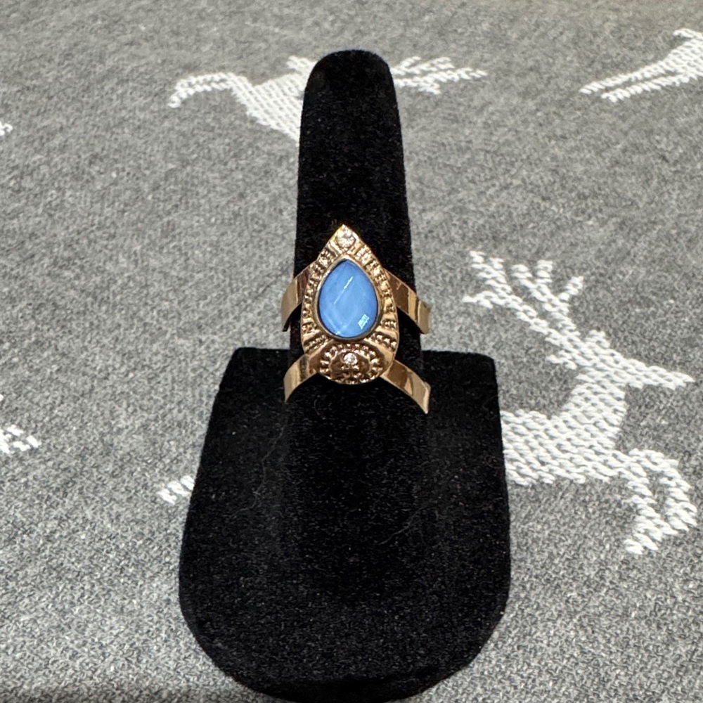 Gold Ring with Blue Teardrop Accent